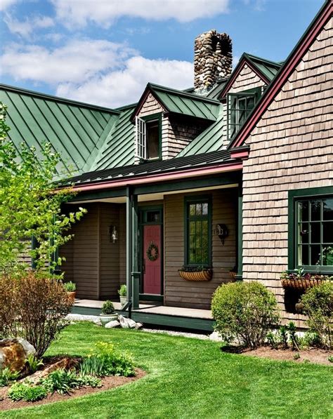 light green house with metal roof|farmhouse with green metal roof.